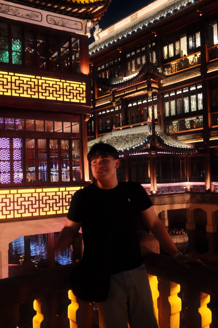 Kenaz at Yu Garden in Shanghai, the pavilions lit up at night